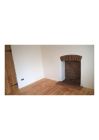 Fireplace and restored floor